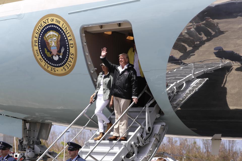 <p>President Donald Trump waves from Air Force One upon arrival with first lady Melania Trump, at the Luis Muniz Air National Guard Base in San Juan, Puerto Rico, Tuesday, Oct. 3, 2017. Trump is visiting Puerto Rico in the wake of Hurricane Maria. (Photo: Evan Vucci/AP) </p>