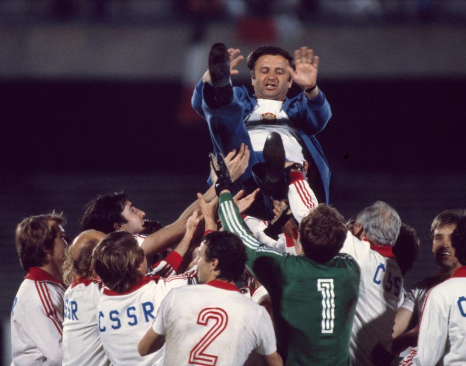 Venglos is thrown in the air by his Czechoslovakia players after their third-place play-off victory against Italy in Naples at the 1980 European Championship  - Eamonn McCabe/Popperfoto via Getty Images