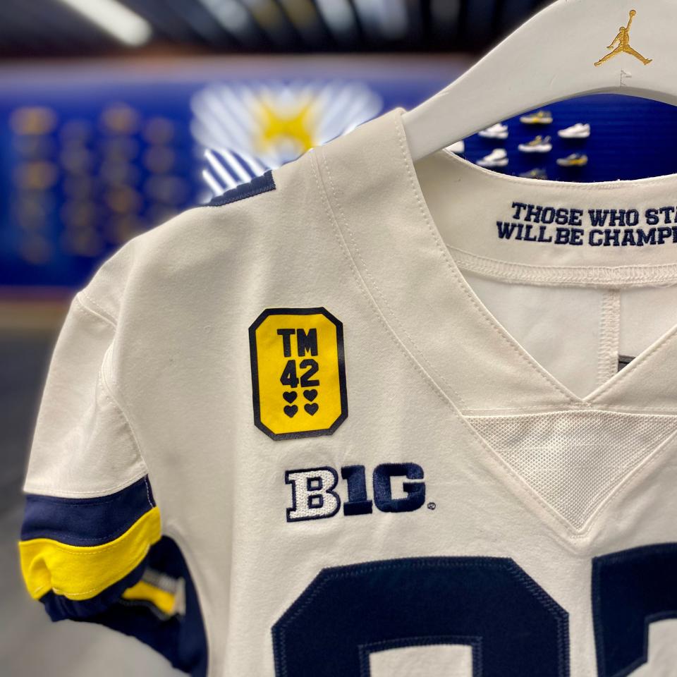 Michigan football will wear this patch paying tribute to the victims in the Oxford High School shooting that left four dead. The "TM 42" stands for Tate Myre, a football player who was killed in the shooting.