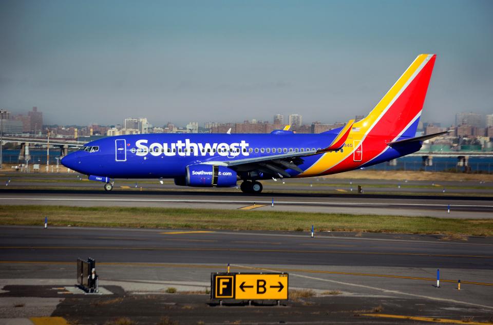 A Southwest Airlines passenger jet (Boeing 737) lands at LaGuardia Airport in New York, New York