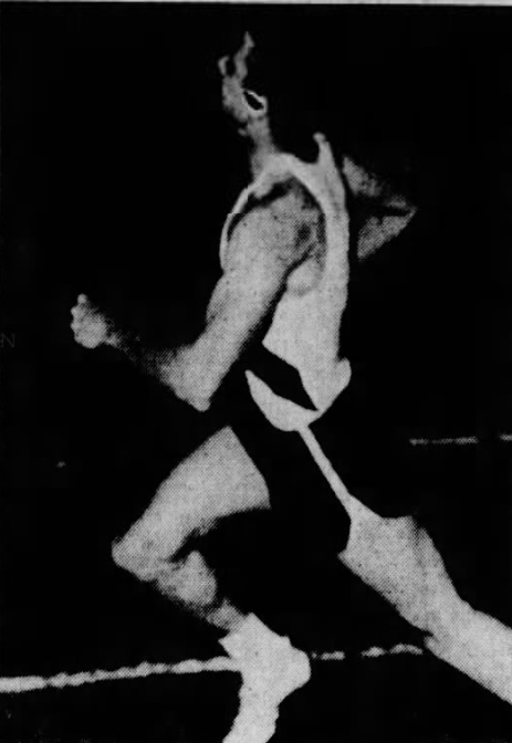 Rod Lambert is a blur as he speeds to victory in the 220-yard at the New Castle County Championships in 1960.