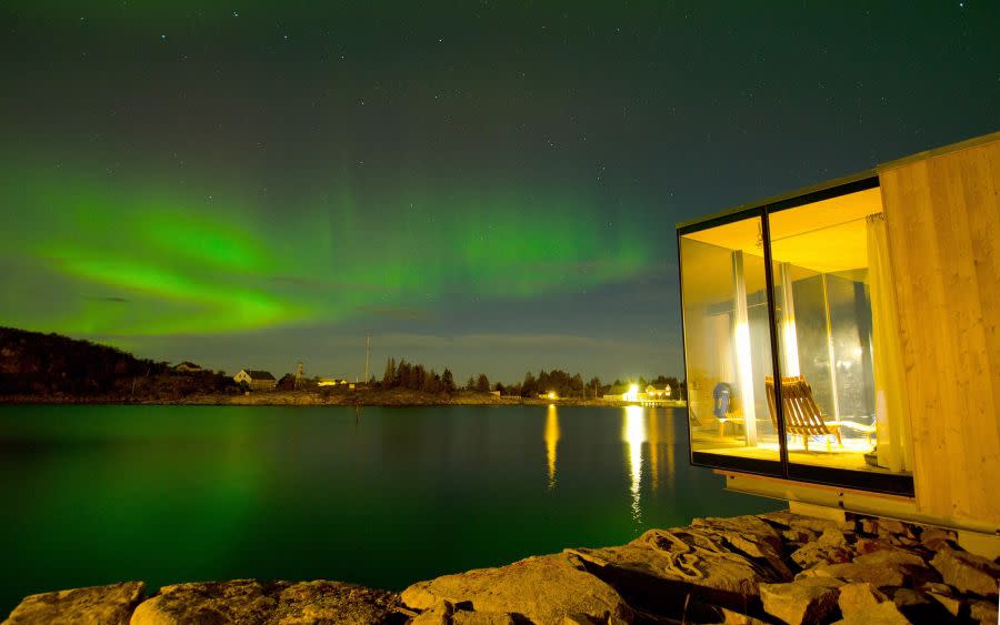 8) Watch the Aurora from a sleek glass cabin in Norway