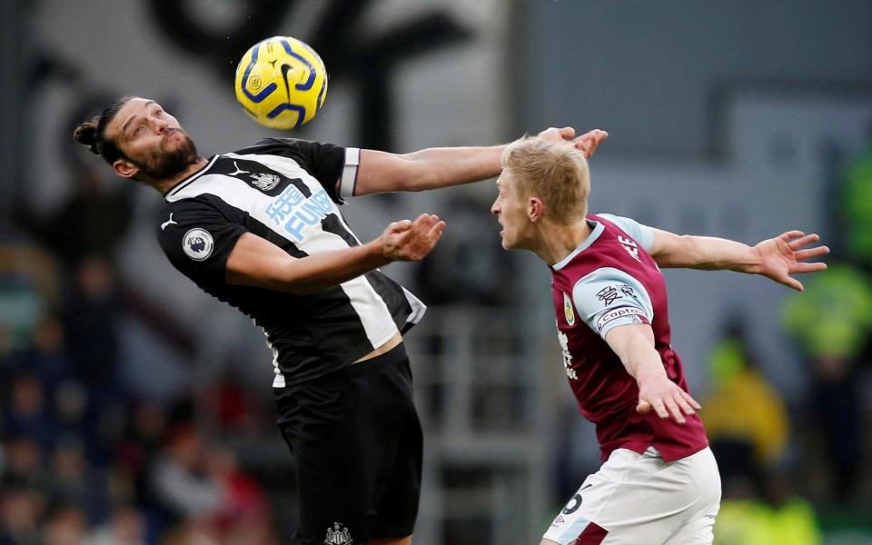 Andy Carroll caught Ben Mee with a stray elbow  - REUTERS