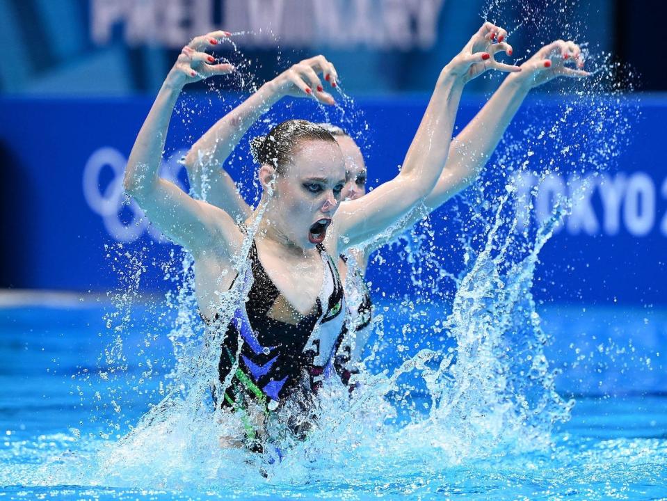 Belarus' Vasilina Khandoshka and Belarus' Daria Kulagina compete in artistic swimming in the Tokyo Olympics.