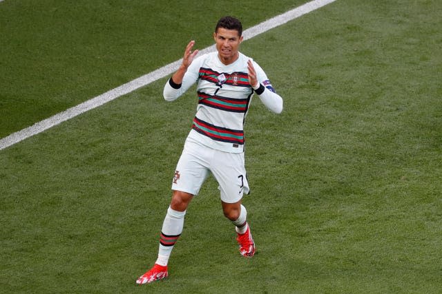 Cristiano Ronaldo reacts after missing a chance