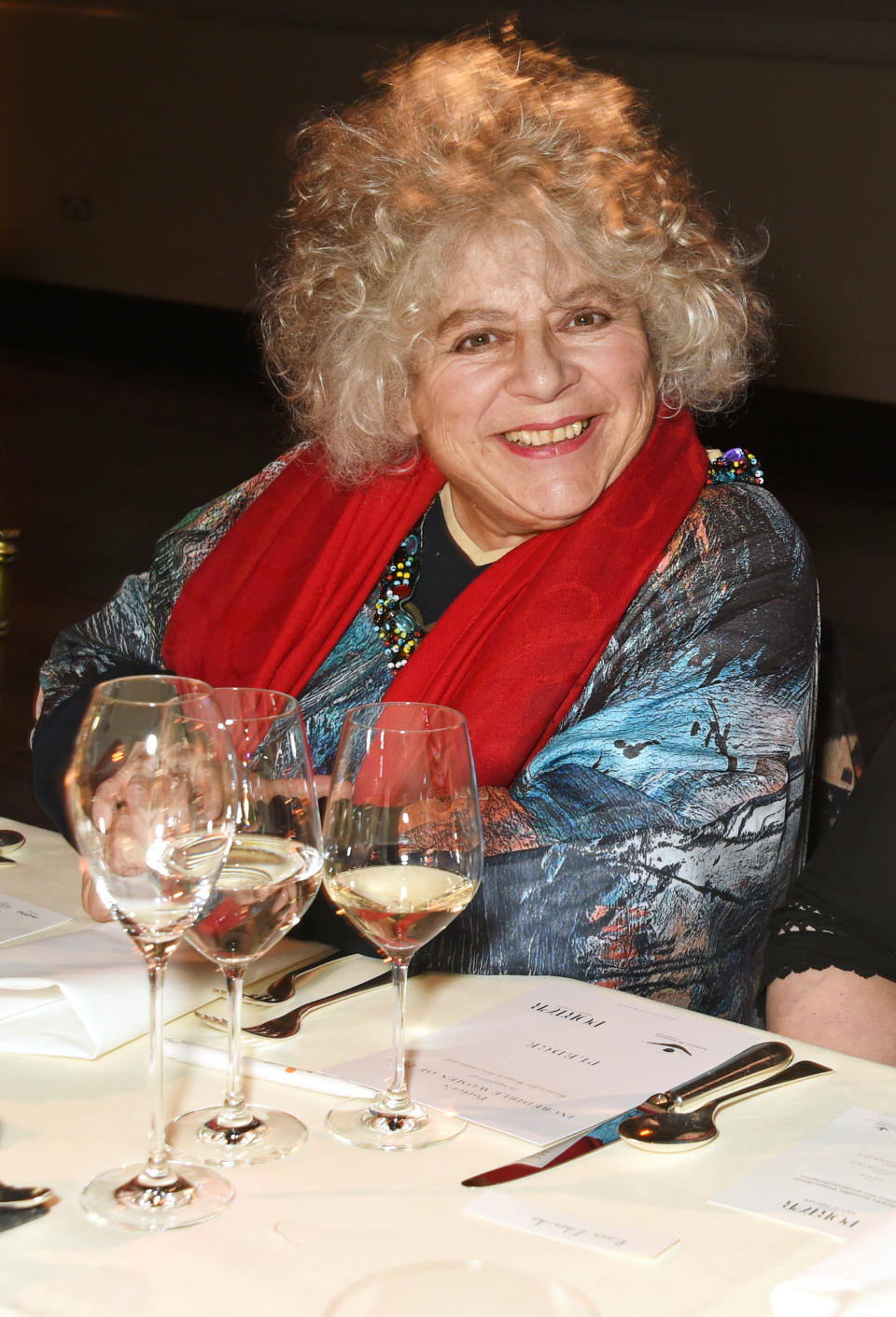 closeup of her at a restaurant table