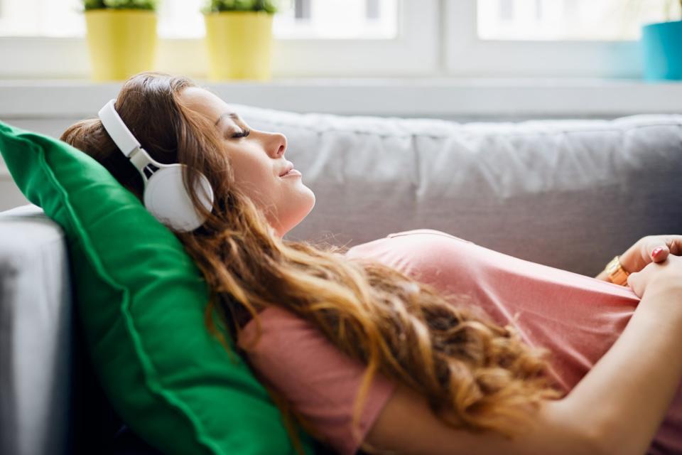 woman napping on sofa