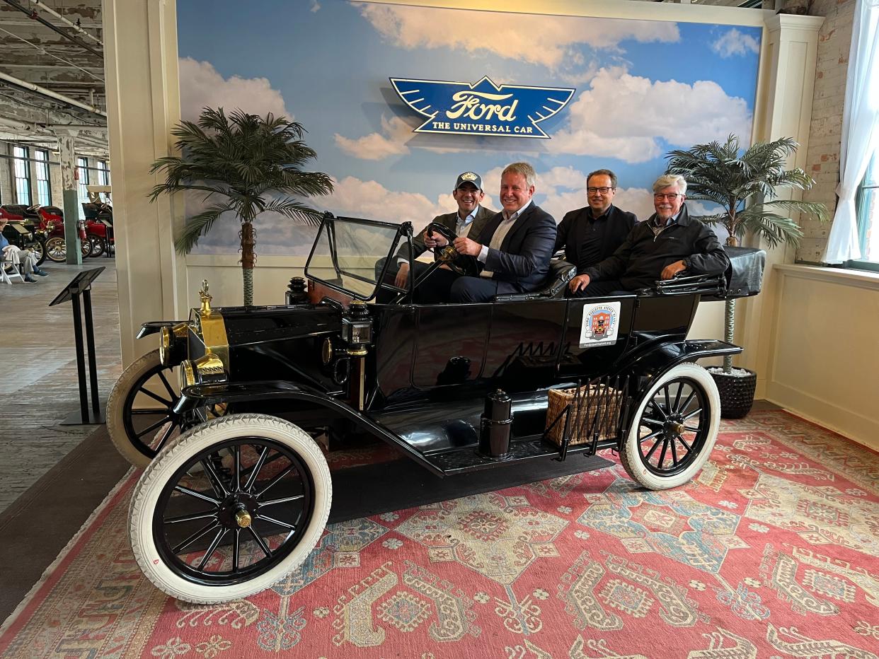Henry Ford III is pictured in our sit-in car in the Dealership Exhibit at the museum. Left of Ford is Phillip Sarofim, founder and chief executive officer of Trousdale Ventures, LLC. Far right is Freeman Thomas, CEO of Meyers Manx who make EV dune buggies. Next to Thomas is Hinrich Woebcken, senior executive advisor, CesiumAstro.