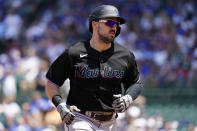 Miami Marlins' Adam Duvall rounds the bases after hitting a two-run home run during the third inning of a baseball game against the Chicago Cubs in Chicago, Saturday, June 19, 2021. (AP Photo/Nam Y. Huh)