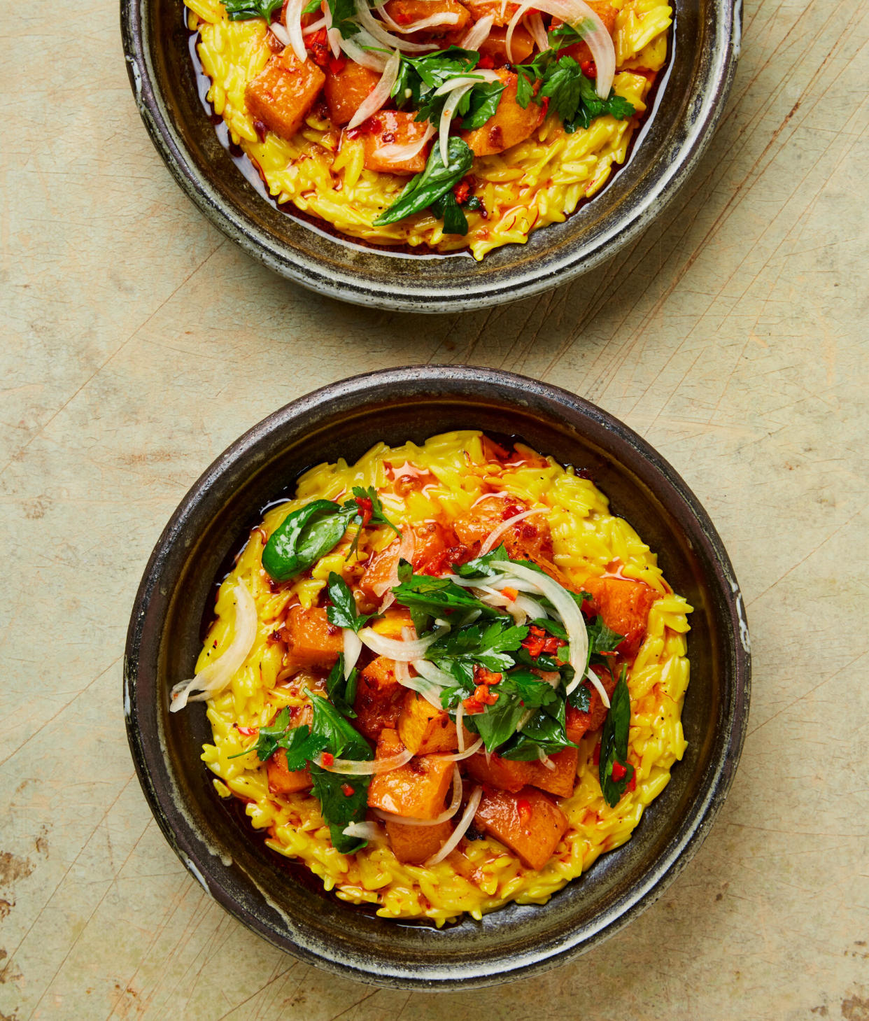 <span>‘Very comforting’: Ixta Belfrage’s creamy saffron orzo with roast butternut squash and scotch bonnet.</span><span>Photograph: Louise Hagger/The Guardian. Food styling: Emily Kydd. Prop styling: Jennifer Kay. Food styling assistant: Valeria Russo.</span>