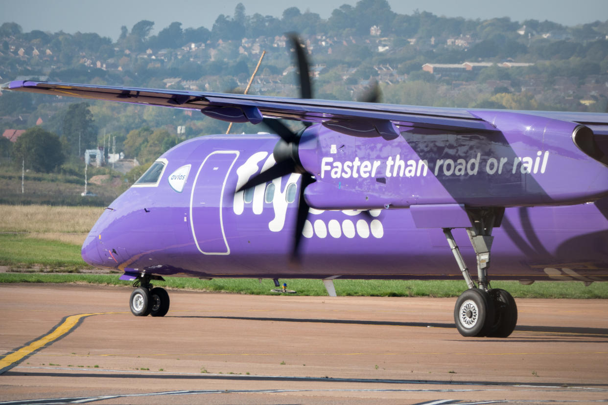 EXETER, ENGLAND - OCTOBER 18: A aircraft operated by the airline Flybe, taxis down the runway at Exeter Airport near Exeter on October 18, 2018 in Devon, England. The value of shares in the Exeter-based airline Flybe, have fallen dramatically recently after the company issued another profit warning, blaming poor demand, a weaker pound and higher fuel costs.(Photo by Matt Cardy/Getty Images)