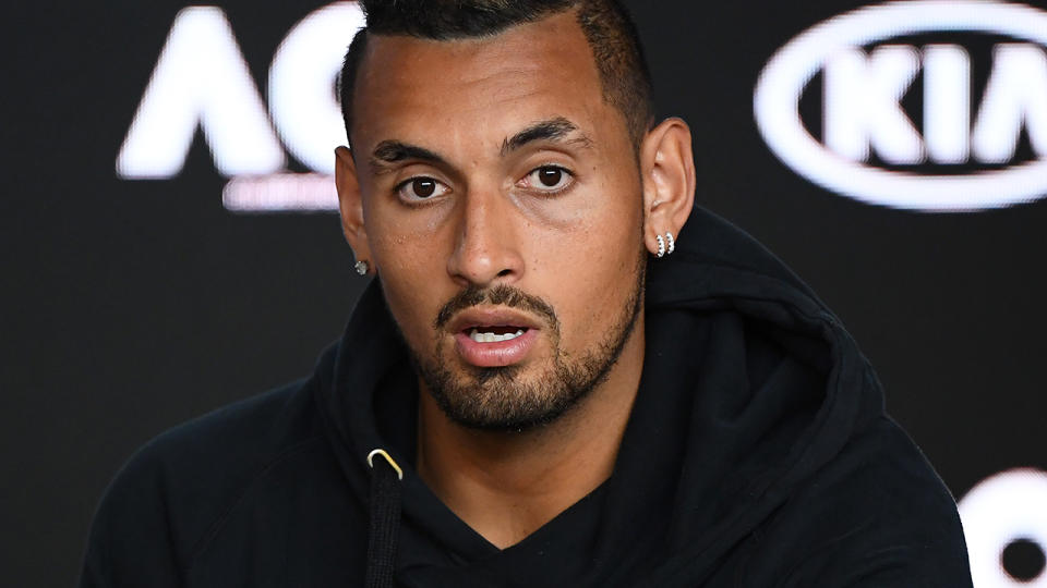 Nick Kyrgios speaks to the media. (Photo by Quinn Rooney/Getty Images)