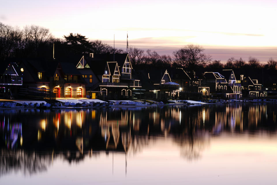 Lights illuminate the outline of structures on Boathouse Row along the banks of the Schuylkill River in Philadelphia, Thursday, March 16, 2023. (AP Photo/Matt Rourke)