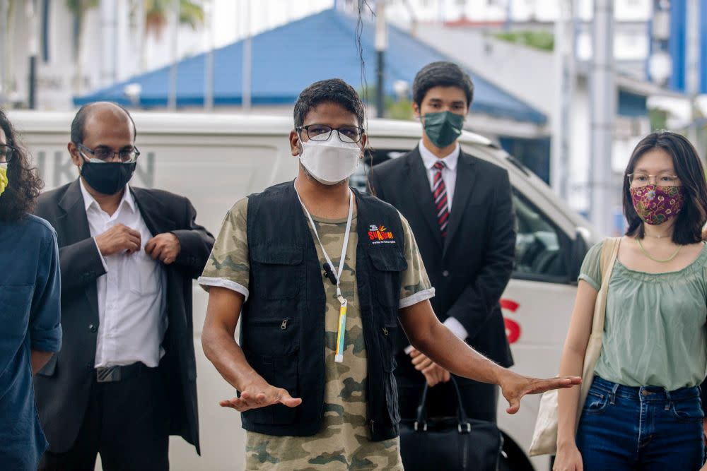 Suaram executive director Sevan Doraisamy speaks to reporters outside Bukit Aman in Kuala Lumpur July 6, 2021. — Picture by Firdaus Latif