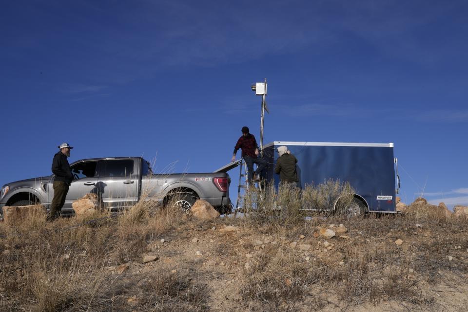 Cloud seeding equipment is installed on Saturday, Dec. 3, 2022, in Lyons, Colo. The technique to get clouds to produce more snow is being used more as the Rocky Mountain region struggles with a two-decade drought. (AP Photo/Brittany Peterson)