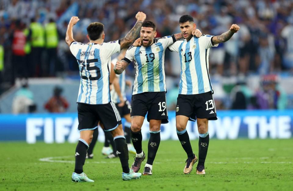 Argentina's Lisandro Martinez, Nicolas Otamendi and Cristian Romero celebrate (REUTERS)