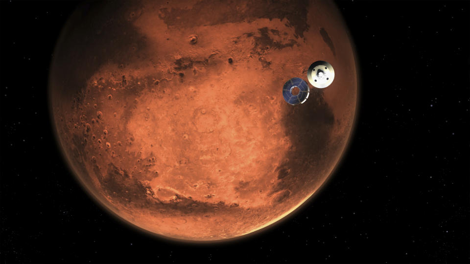 In this illustration made available by NASA, the Perseverance rover casts off its spacecraft's cruise stage, minutes before entering the Martian atmosphere. (NASA/JPL-Caltech via AP)