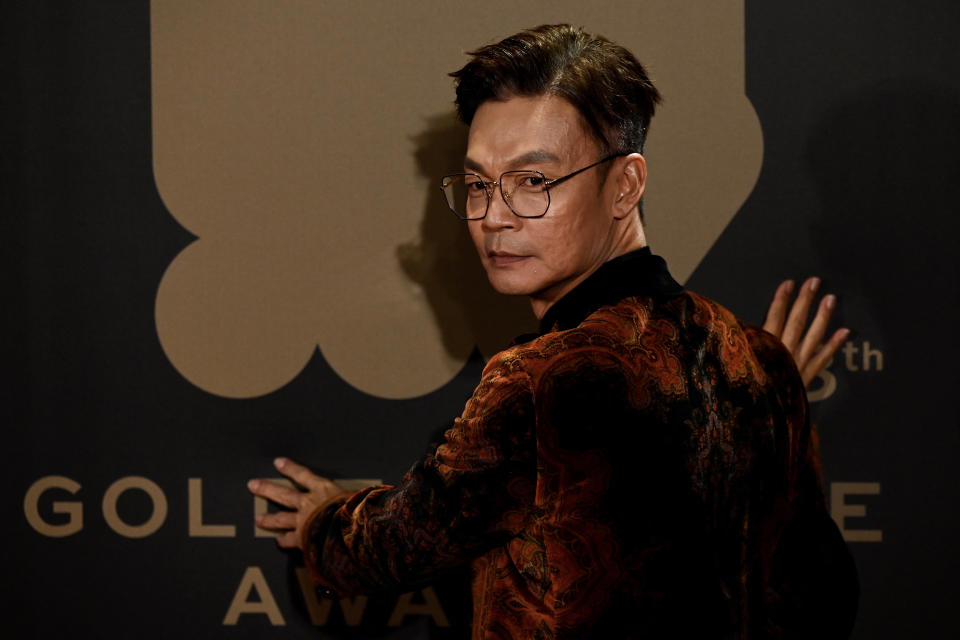 Singaporean actor Mark Lee arrives at the 58th Golden Horse Film Awards in Taipei on November 27, 2021. / AFP / Sam Yeh