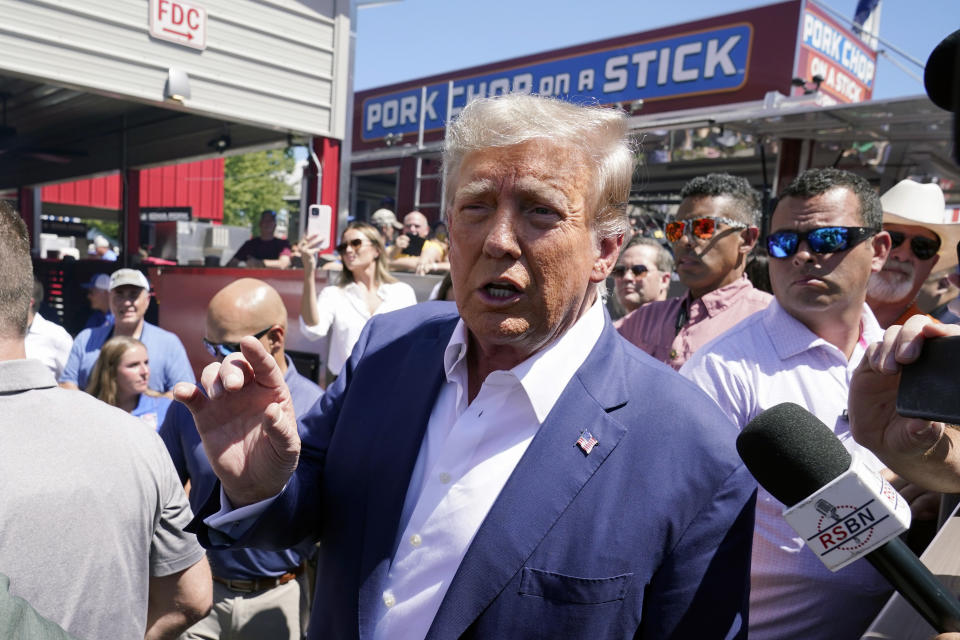 Republican presidential candidate former President Donald Trump speaks while visiting the Iowa Pork Producers tent at the Iowa State Fair, Saturday, Aug. 12, 2023, in Des Moines, Iowa. (AP Photo/Charlie Neibergall)