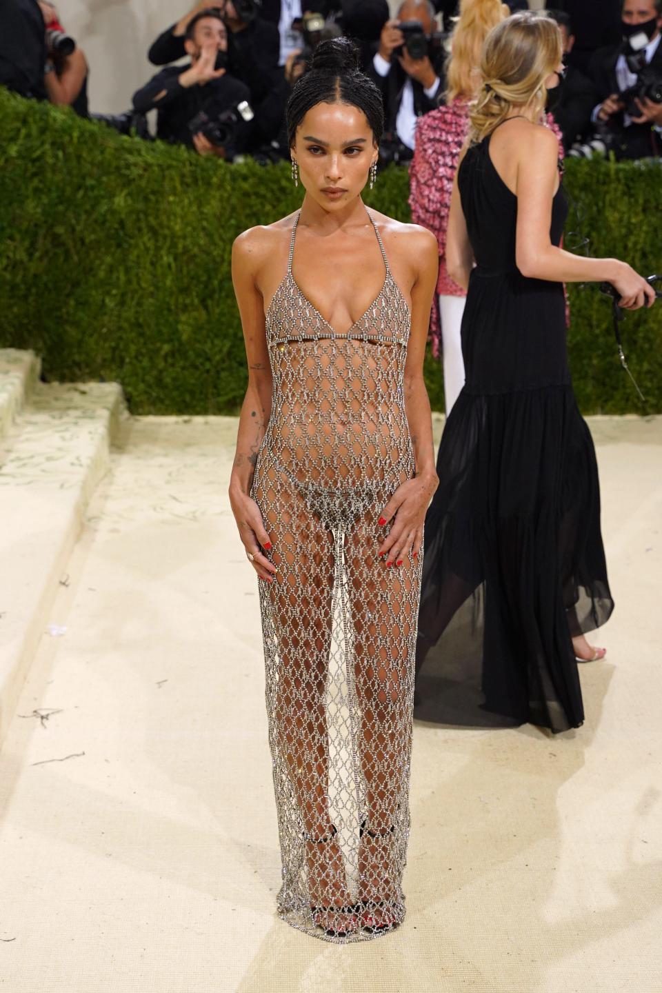 Zoe Kravitz wears a netted, see-through dress at the Met Gala
