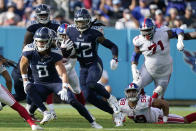 Tennessee Titans running back Derrick Henry (22) runs for a first down during the first half of an NFL football game against the New York Giants Sunday, Sept. 11, 2022, in Nashville. (AP Photo/Mark Humphrey)