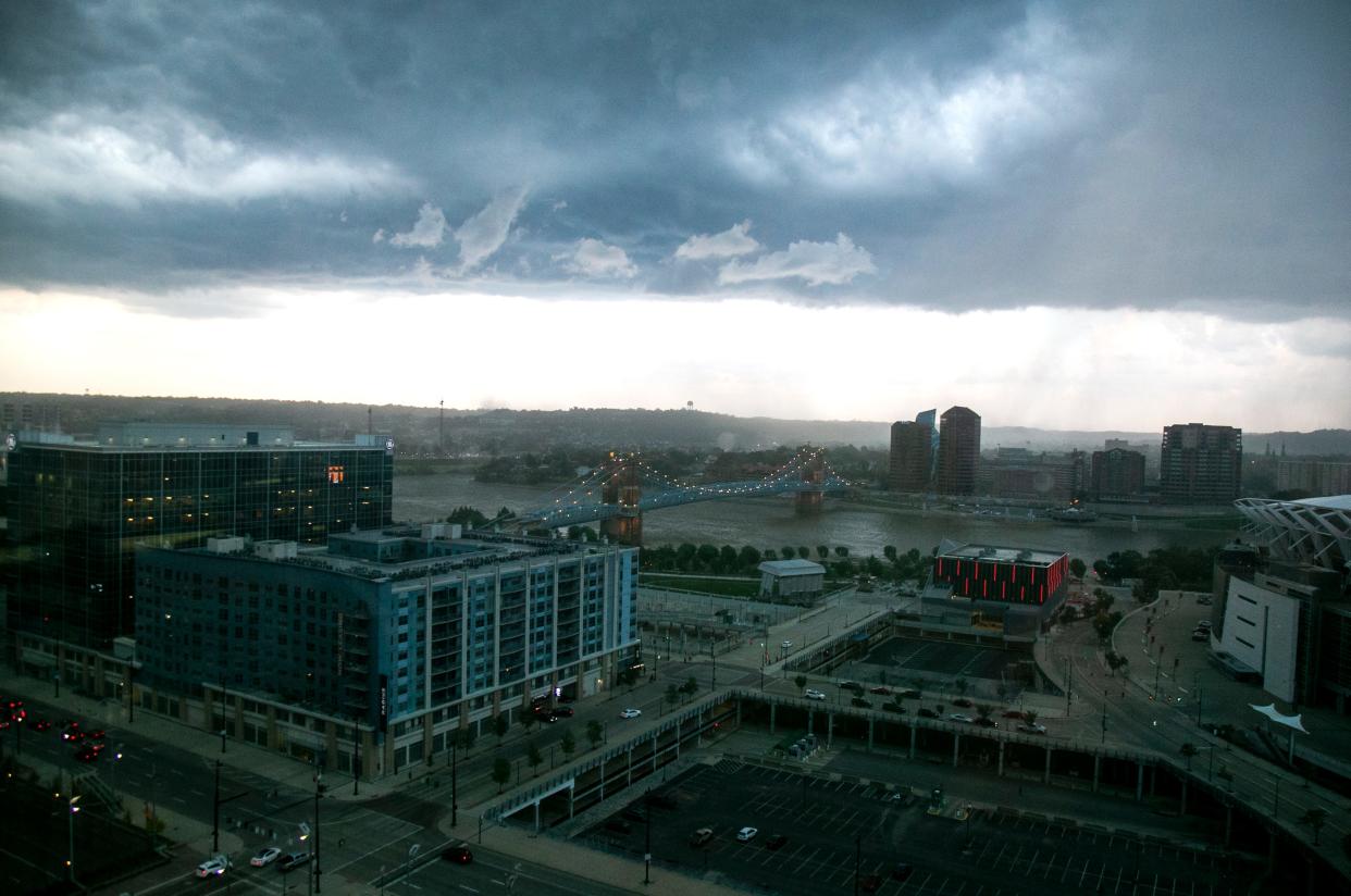 Clouds form over The Banks and the Ohio River as a thunderstorm hits downtown and the Greater Cincinnati area Wednesday, June 22, 2022.