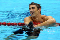 <b>Michael Phelps - 27 </b><br> Michael Phelps of the United States celebrates after winning the gold in the Men's 4 x 200m Freestyle Relay final on Day 4 of the London 2012 Olympic Games at the Aquatics Centre on July 31, 2012 in London, England. (Photo by Ezra Shaw/Getty Images)