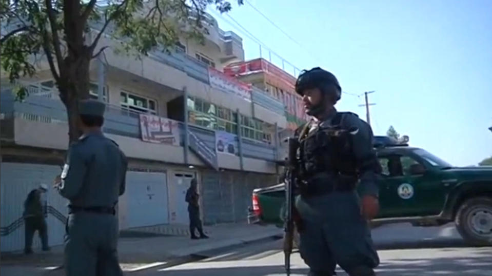 Afghan security personnel inspect the site of a car bomb attack in the western part of Kabul, Afghanistan July 24, 2017. REUTERS/Reuters TV