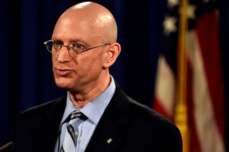 IRS Criminal Division Chief Richard Weber details the filing of civil forfeiture complaints seeking the forfeiture and recovery of more than $1 billion in assets associated with an international conspiracy to launder funds misappropriated from a Malaysian sovereign wealth fund 1MDB in Washington July 20, 2016. REUTERS/James Lawler Duggan