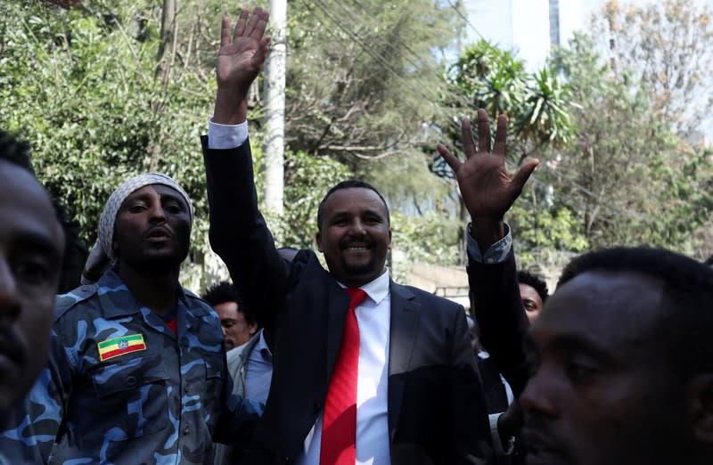 Jawar Mohammed, an Oromo activist and leader of the Oromo protest waves to his supporters outside his house in Addis Ababa