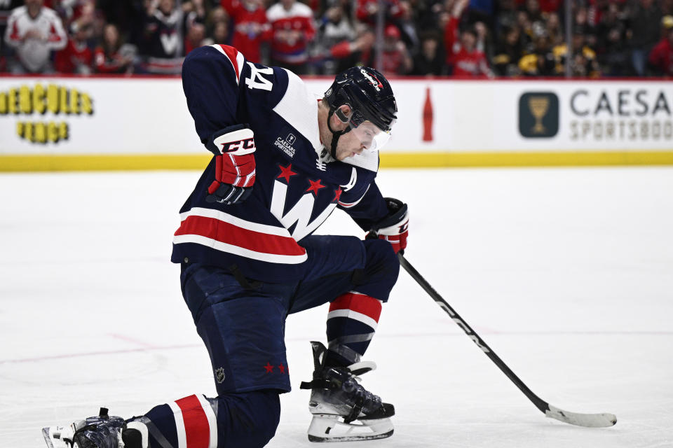 Washington Capitals defenseman John Carlson celebrates his goal against the Boston Bruins during the second period of an NHL hockey game Saturday, March 30 2024, in Washington. (AP Photo/Nick Wass)