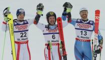 Alpine Skiing - FIS Alpine Skiing World Championships - Men's Giant Slalom - St. Moritz, Switzerland - 17/2/17 - Austria's gold medalist Marcel Hirscher is flanked by his country fellow and silver medal winner Roland Leitinger (L) and Norway's bronze medalist Leif Kristian Haugen. REUTERS/Ruben Sprich