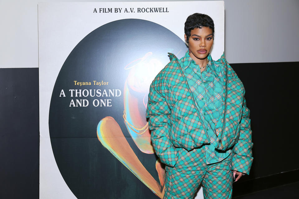 Teyana Taylor wearing green plaid. 