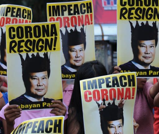 Protesters rally against Supreme Court chief justice Renato Corona in Manila in 2011. Philippine senators on Tuesday found Corona, the country's top judge, guilty of corruption, paving the way for him to be sacked in the biggest win of President Benigno Aquino's anti-graft crusade