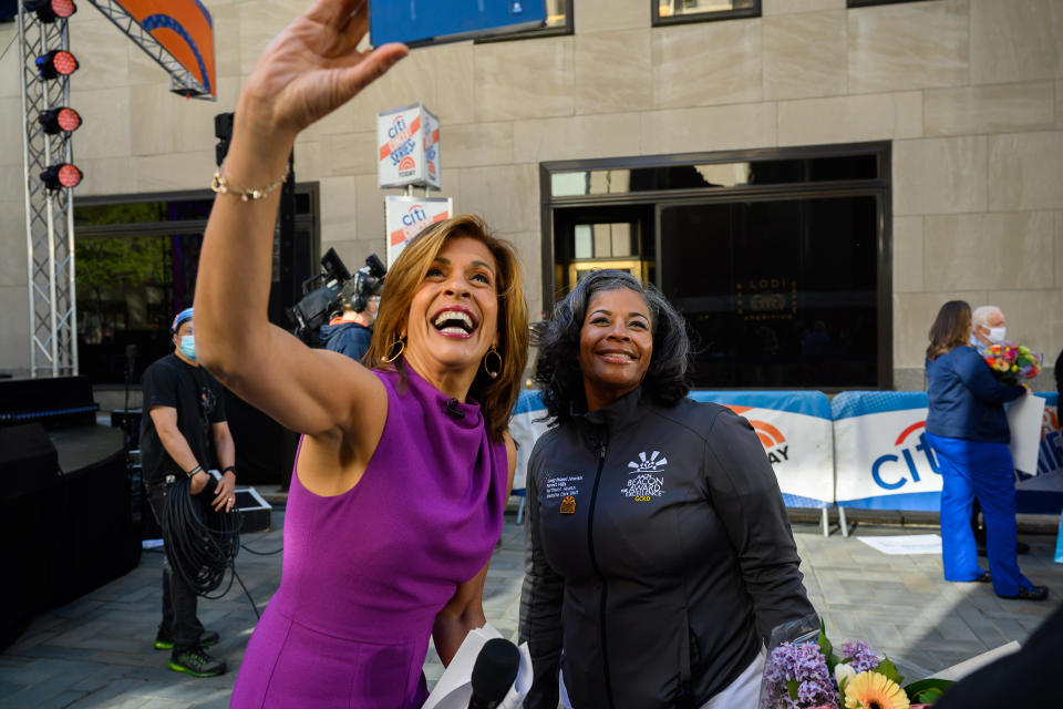 Hoda Kotb celebrated the return of live music on the plaza with a sweet moment with one of the nurses being honored for National Nurses Day.  (Nathan Congelton / TODAY)