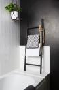 <p>A simple monochrome scheme smartens up any bathroom. We also love the small ladder which has been used as a towel rail. </p><p><a class="link " href="https://www.housebeautiful.com/uk/renovate/homes-makeovers/a3167/rent-to-buy-north-yorkshire-home-diy-decorating/" rel="nofollow noopener" target="_blank" data-ylk="slk:TAKE A TOUR;elm:context_link;itc:0;sec:content-canvas">TAKE A TOUR</a></p>