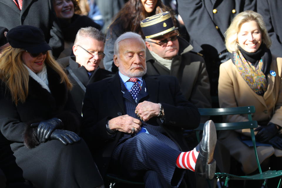 <p>Honorary Grand Marshall Buzz Aldrin shows off his colorful socks during a ceremony before the Veterans Day parade on Fifth Avenue in New York on Nov. 11, 2017. (Photo: Gordon Donovan/Yahoo News) </p>