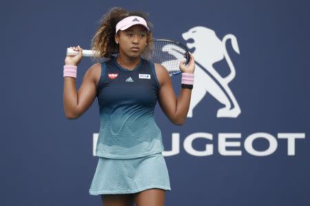 Mar 23, 2019; Miami Gardens, FL, USA; Naomi Osaka of Japan reacts after losing a point against Su-Wei Hshieh of Chinese Taipei (not pictured) in the second round of the Miami Open at Miami Open Tennis Complex. Mandatory Credit: Geoff Burke-USA TODAY Sports
