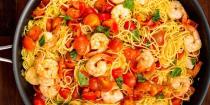 <p>You're going to be making this satisfying <a href="https://www.delish.com/uk/cooking/recipes/g32331046/prawn-recipes/" rel="nofollow noopener" target="_blank" data-ylk="slk:prawn;elm:context_link;itc:0;sec:content-canvas" class="link ">prawn</a> pasta all summer long.</p><p>Get the <a href="https://www.delish.com/uk/cooking/recipes/a32808431/bruschetta-shrimp-pasta-recipe/" rel="nofollow noopener" target="_blank" data-ylk="slk:Bruschetta Prawn Pasta;elm:context_link;itc:0;sec:content-canvas" class="link ">Bruschetta Prawn Pasta</a> recipe.</p>