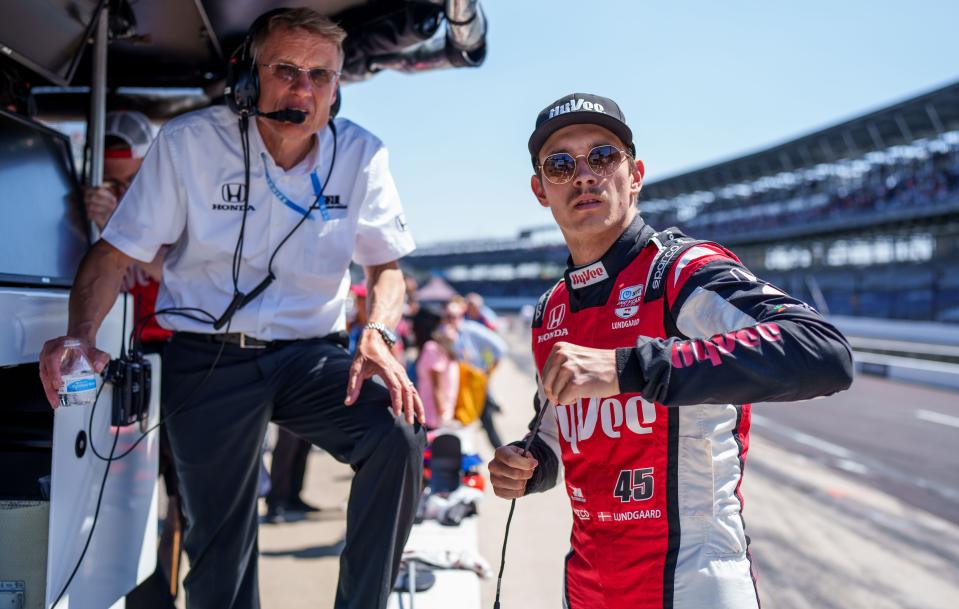 Rahal Letterman Lanigan Racing driver Christian Lundgaard (45) talks with a crew member Sunday, May 21, 2023, before the Last Chance Qualifying session at Indianapolis Motor Speedway in preparation for the 107th running of the Indianapolis 500.