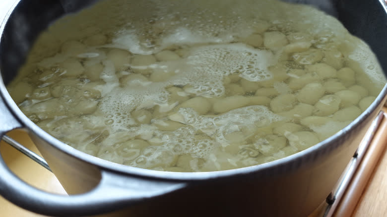 Beans boiling in a pot 