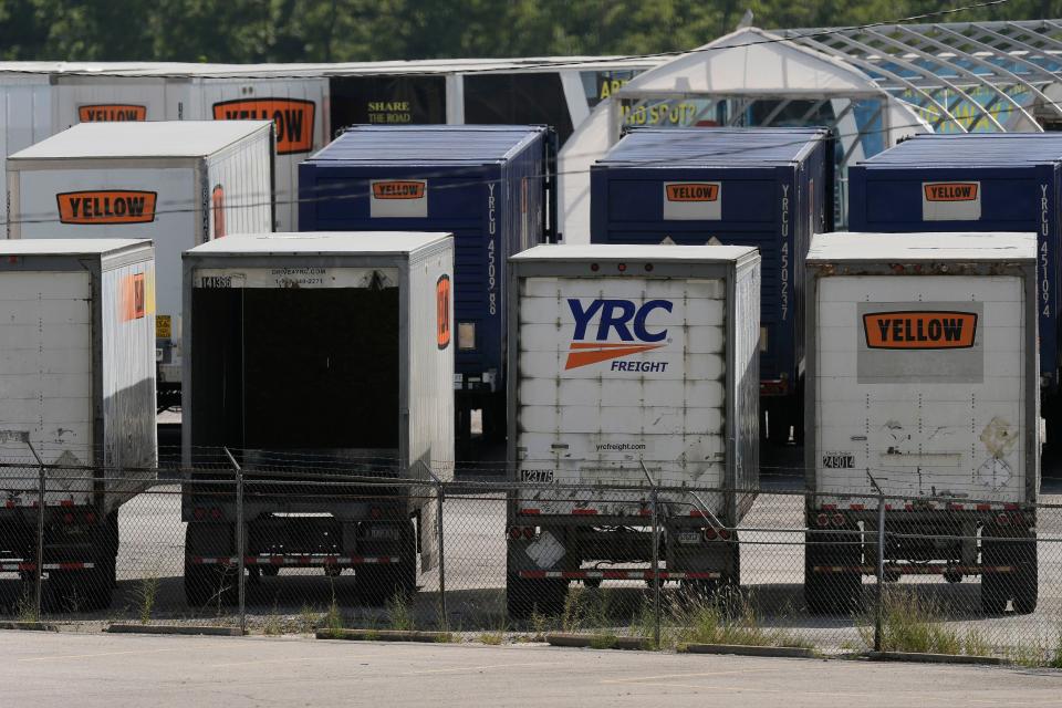 Yellow Corp. trucks are seen at a YRC Freight terminal Friday, July 28, 2023, in Kansas City, Mo. After years of financial struggles, Yellow is reportedly preparing for bankruptcy and seeing customers leave in large numbers — heightening risk for future liquidation. While no official decision has been announced by the company, the prospect of bankruptcy has renewed attention around Yellow's ongoing negotiations with unionized workers, a $700 million pandemic-era loan from the government and other bills the trucker has racked up over time. (AP Photo/Charlie Riedel)