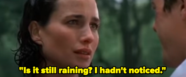 A woman asking a man, "Is it still raining? I hadn't noticed."