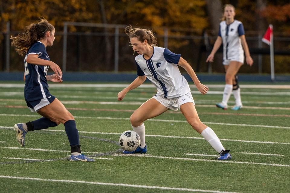 R #2 Chelsea Renna and C #14 Riley Cross with the ball. Randolph plays Chatham in the Morris County Tournament girls soccer finals on Saturday, October 21, 2023.