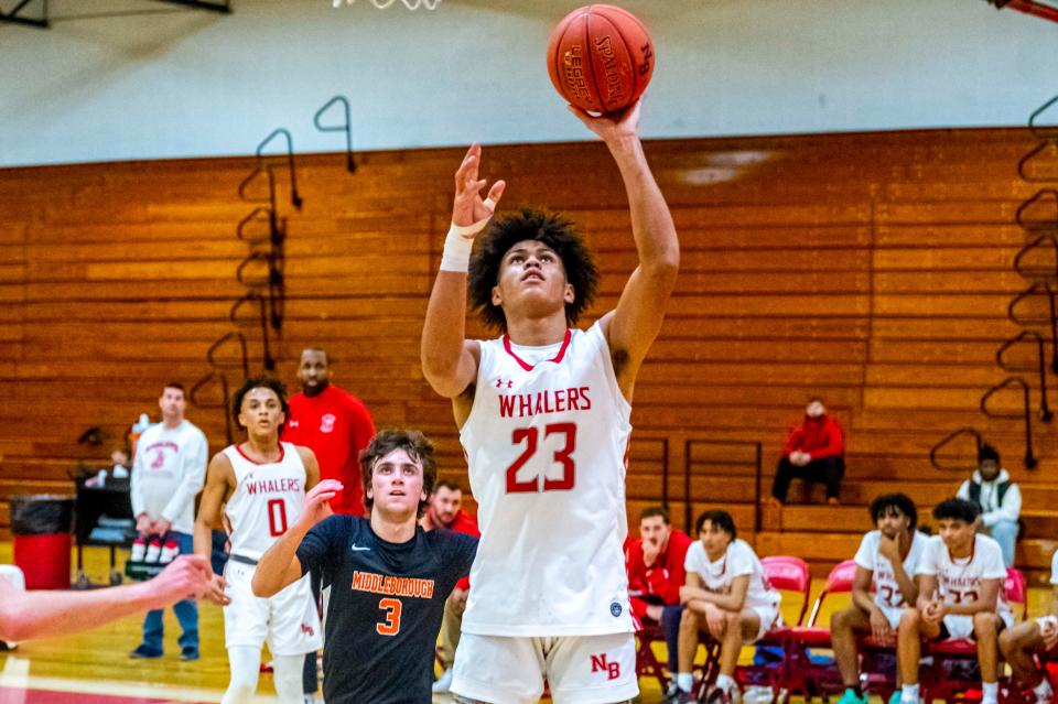 New Bedford's Anthony Diakite lays it in for the Whalers.  Diakite finished with team high 16 points.