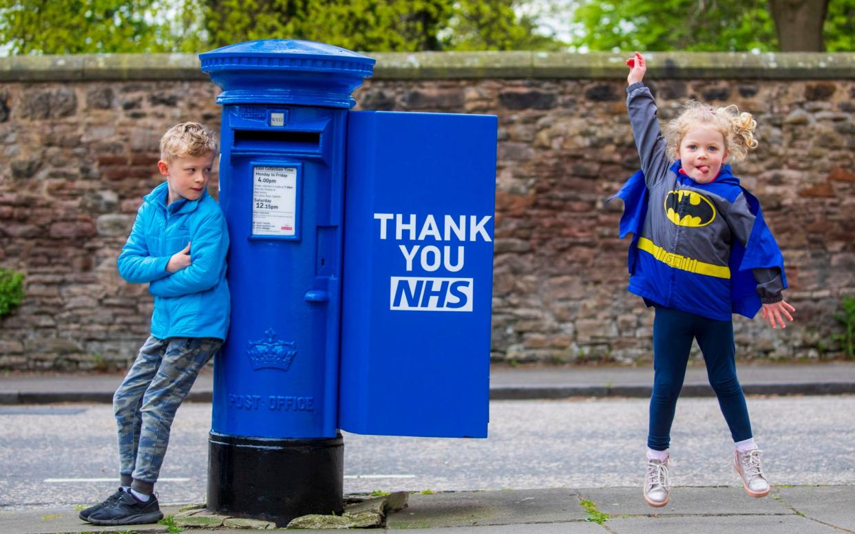 A postbox in Edinburgh decorated blue in tribute to the NHS - Royal Mail / PA 