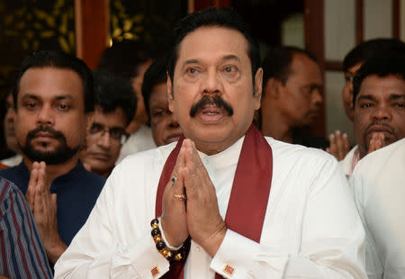 Sri Lanka's former leader Mahinda Rajapaksa attends a religious ceremony after he resigned from the prime minister post in Colombo, Sri Lanka December 15, 2018. REUTERS/Stringer