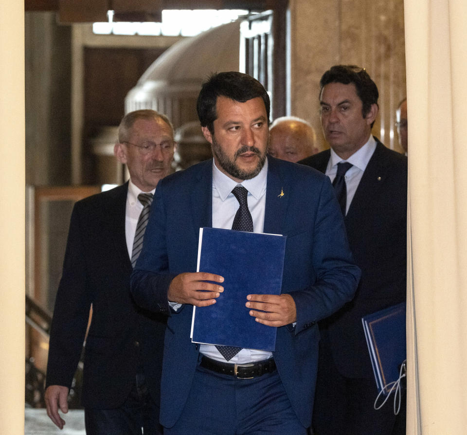 Italian Interior Minister Matteo Salvini, center, arrives for a joint press conference with Hungarian Interior Minister Sandor Pinter, background left, at the Ministry of Interior in Budapest, Hungary, Thursday, May 2, 2019. (Zsolt Szigetvary/MTI via AP)