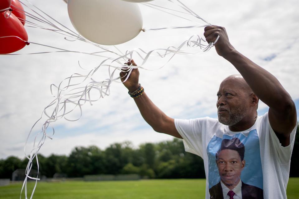 Jul 31, 2022; Columbus, Ohio, United States;  Lamont Turner died by suicide after being sexually abused by his doctor. His family releases balloons outside the school he previously worked at, Walnut Ridge, at 1 p.m., July 31, which is the anniversary of his death. 