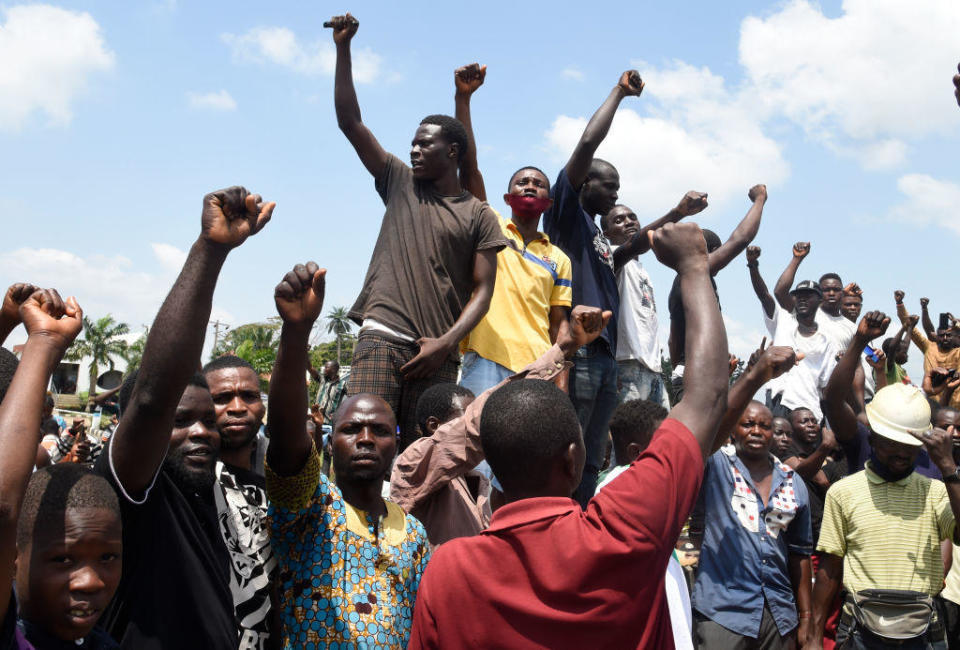 Protesters chant and sing solidarity songs as they barricade an expressway in Magboro, Ogun State, on October 21, 2020. / Credit: PIUS UTOMI EKPEI/AFP via Getty